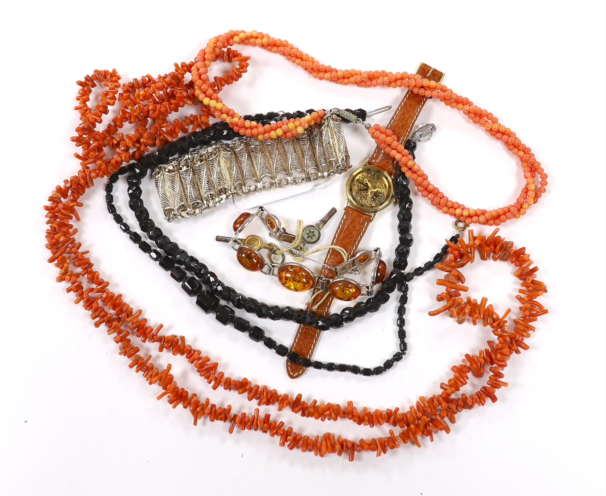 A continental 835 filigree white metal bracelet, a 925 and amber bracelet and other items including a wrist watch and a coral branch necklace.